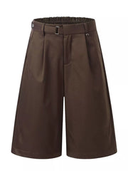 Brown pleated wide-leg capris with elastic waistband and buckle detail