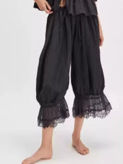 100% polyester Care instructions: Machine wash cold lounge pants in Black with relaxed silhouette