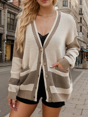 Waffle knit colorblock cardigan with V-neck, buttons, and pockets in beige and brown.