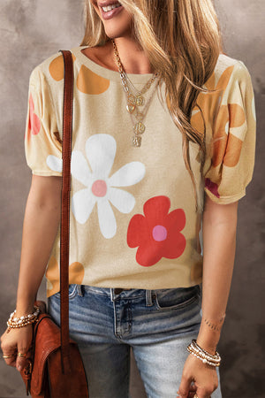 Tan puff sleeve top with large floral print and scoop neck.