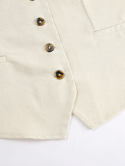 Cream cotton vest with tortoise shell buttons and pocket detail