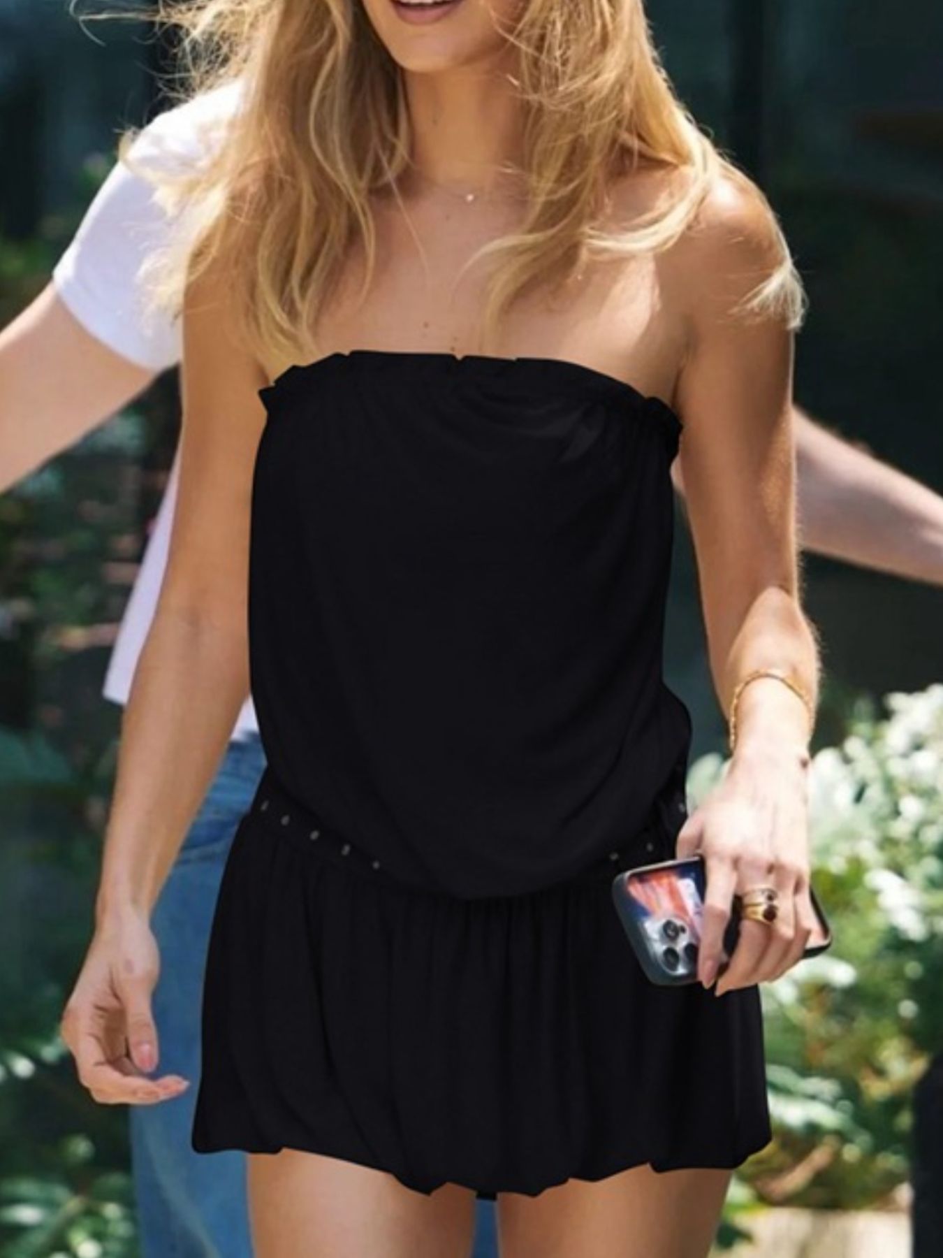 Ruched strapless black mini dress with studded waistband detail