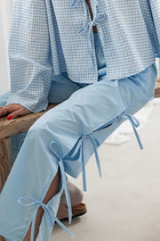 Light Blue Palazzo Trousers with side tie details and leg slits.