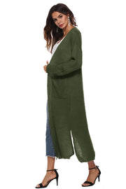 Longline knit cardigan in Army Green with side slits and pockets.