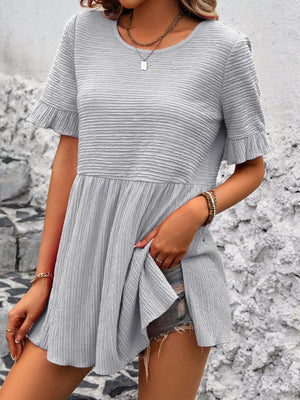 Light gray textured babydoll blouse with flutter sleeves and a scoop neck.