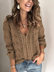 Brown chevron knit cardigan with button-down front and openwork details.