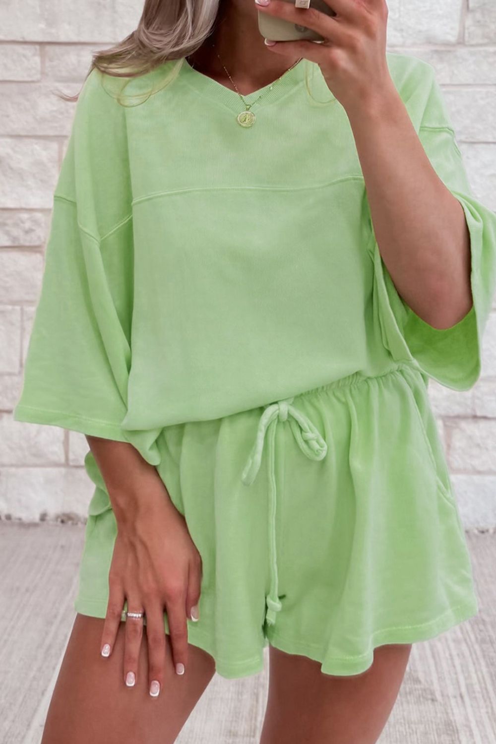Lime cotton loungewear set with relaxed fit top and drawstring shorts
