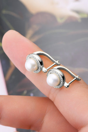 Pearl halo leverback earrings with cubic zirconia accents in silver.