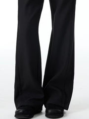 Men's black wide-leg trousers with a full-length cut.