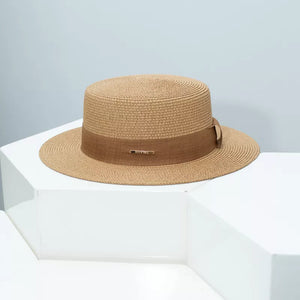 Woven straw boater hat in Khaki with a brown ribbon band and gold detail.