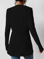 Black single-button blazer with tailored fit and long sleeves.