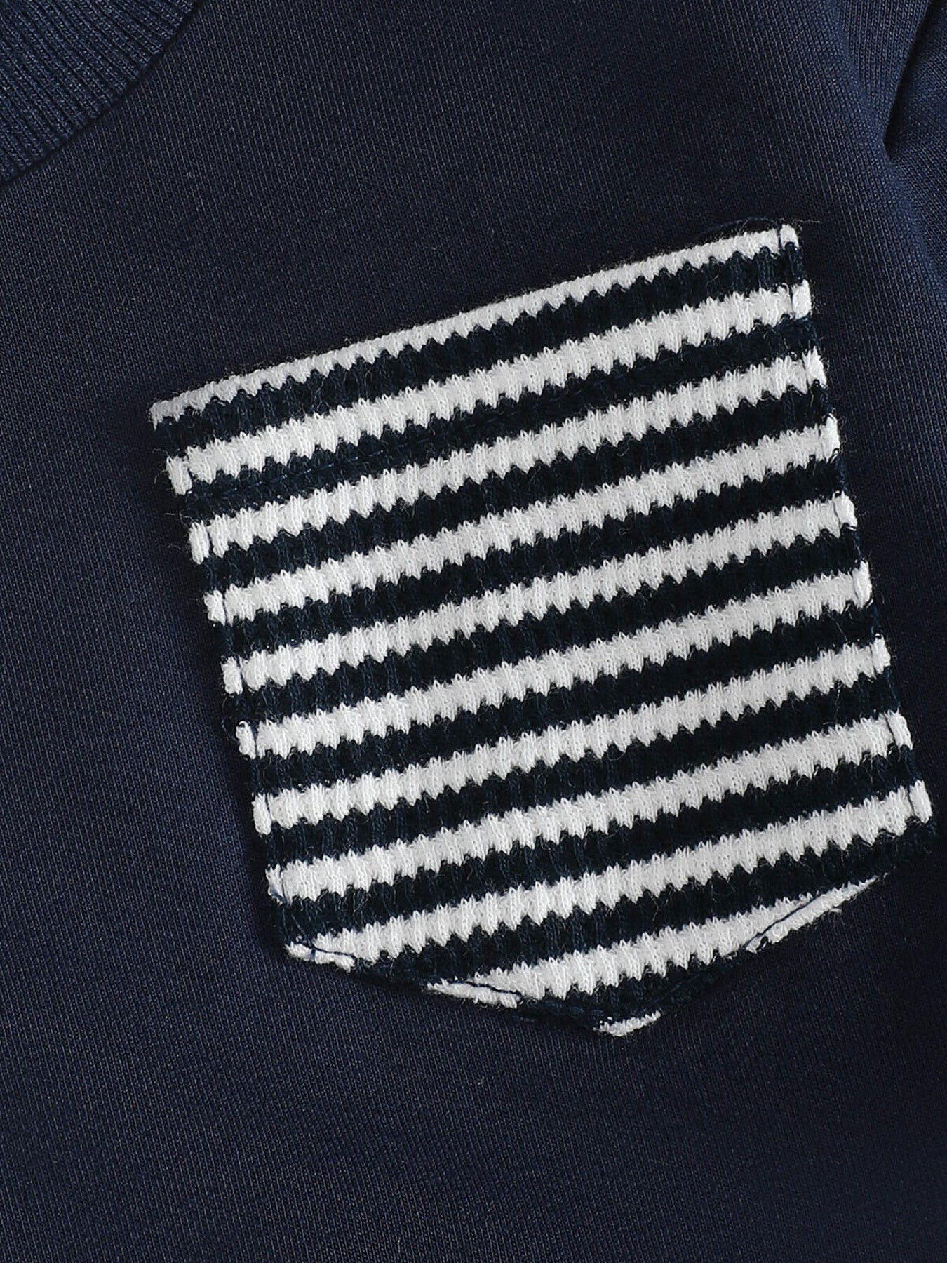 Children's navy cotton sweatshirt with a striped pocket detail.
