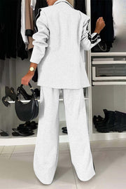 Light gray track stripe blazer and wide leg trouser set with black sleeve stripes