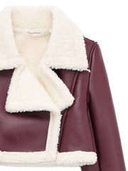 Burgundy cropped aviator jacket with white shearling trim and collar.