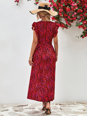 Emerald floral wrap midi dress in deep red with flutter sleeves and belted waist.