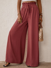 Rust ruffled waist palazzo trousers with drawstring and wide leg