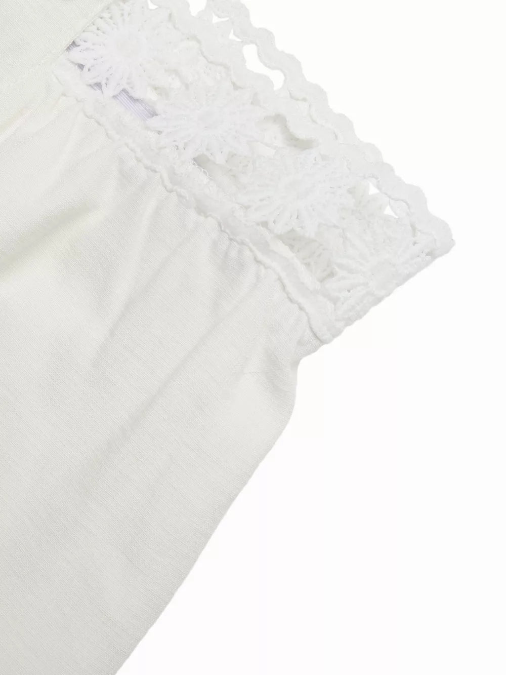 White wide-leg pants with crochet trim detail