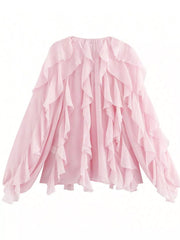 Pink sheer long-sleeve blouse with cascading ruffles.