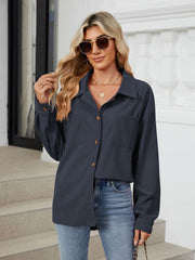 Dark Navy corduroy overshirt with buttoned pockets and collar, long sleeves.