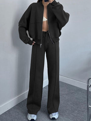 Black zip-up bomber jacket and wide-leg sweatpants set with drawstring waist