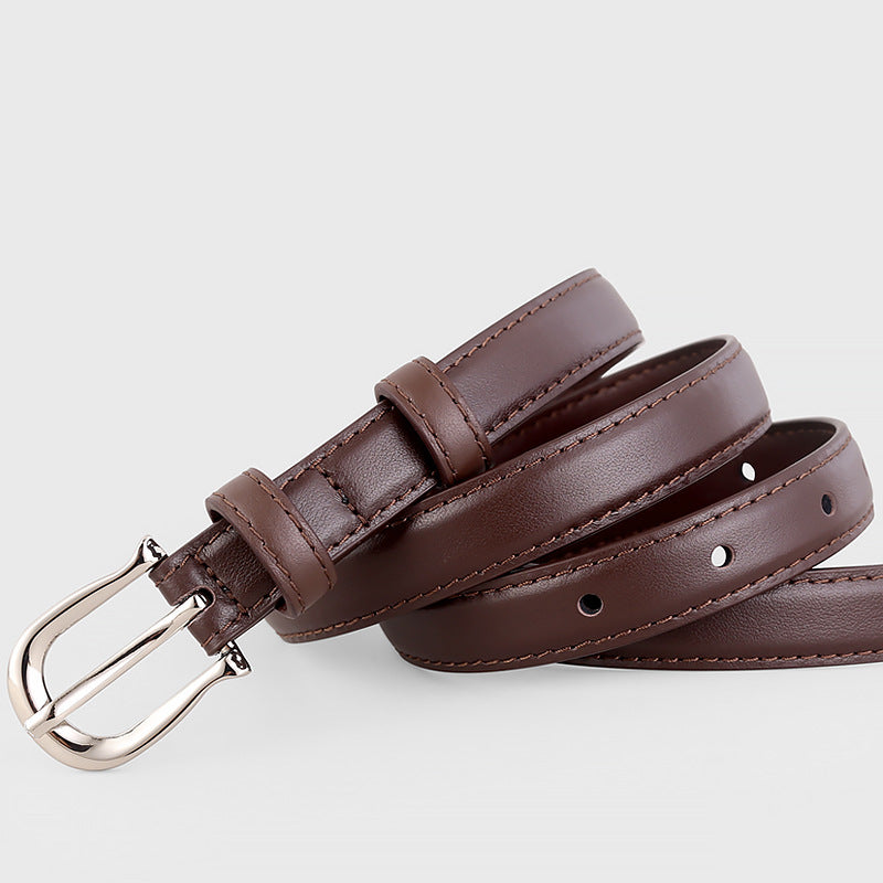 Brown leather skinny belt with silver buckle and adjustable holes