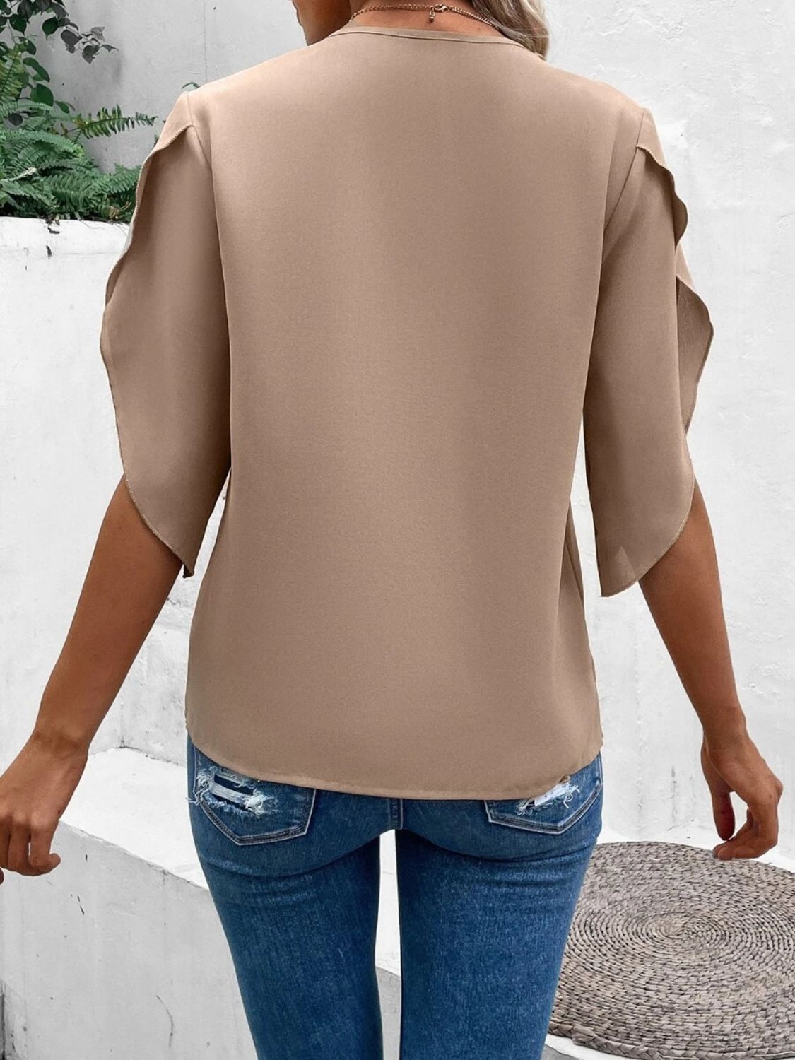 Tan flutter sleeve blouse with scalloped lace trim detail