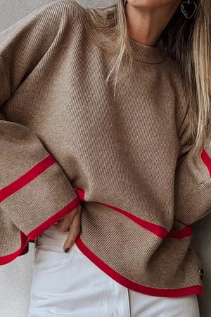 Mocha ribbed knit pullover sweater with red trim details on sleeves and hem.