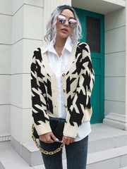 Geometric houndstooth V-neck cardigan in acrylic with button front.