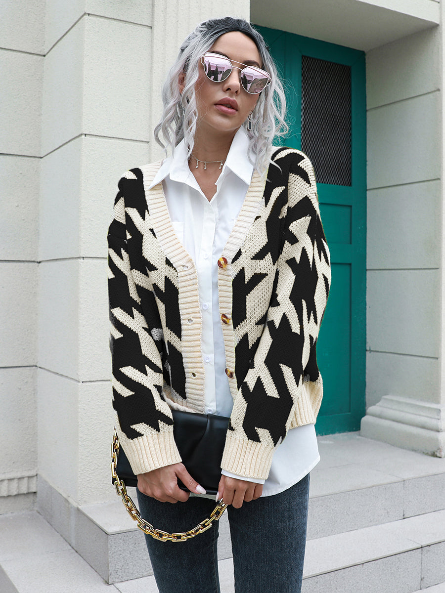 Geometric houndstooth V-neck cardigan in acrylic with button front.