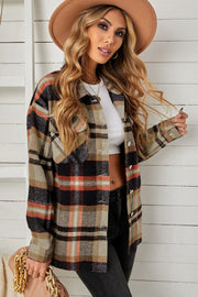 Relaxed plaid shacket with patch pockets and buttoned front in tan, black, and coral.