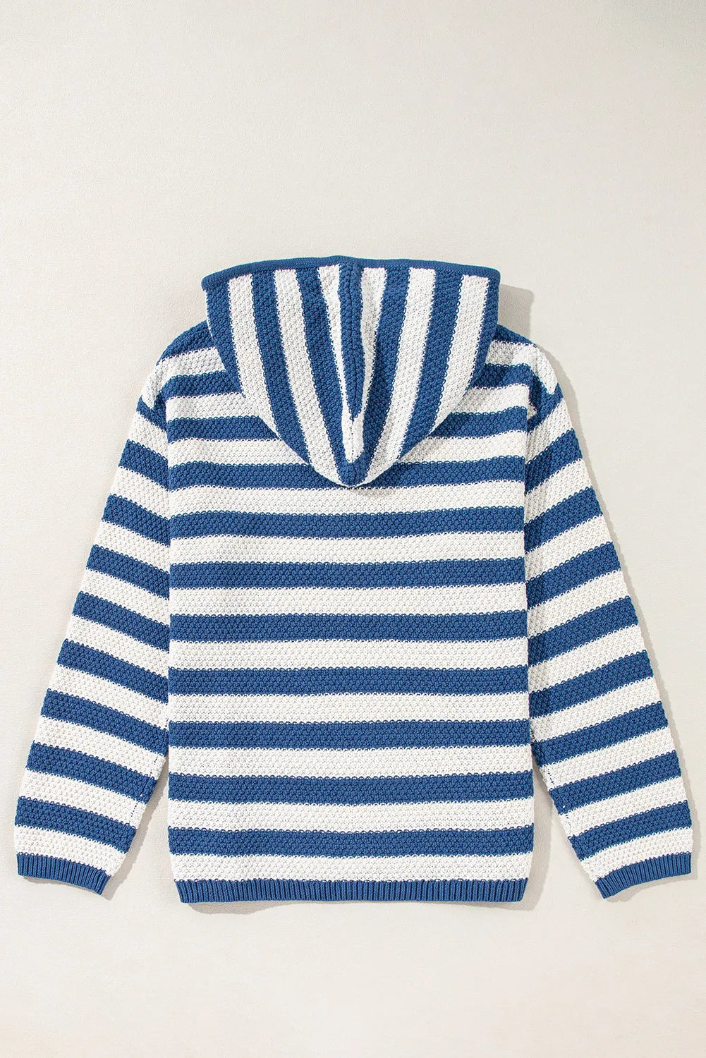 Textured knit hoodie with blue and white stripes and a drawstring hood.