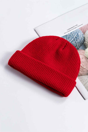 Red ribbed knit beanie with a turn-up cuff