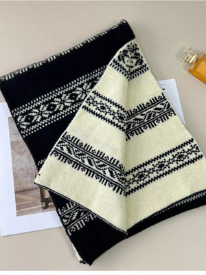 Reversible black and cream wool blend scarf with snowflake pattern