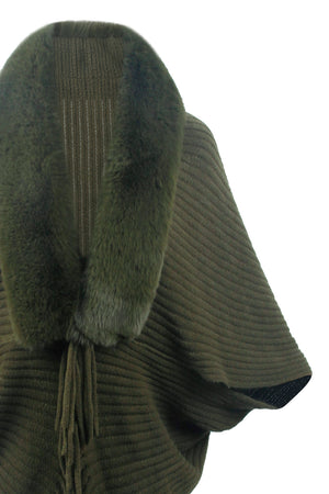 Army green knit cape with faux fur collar and fringe detail