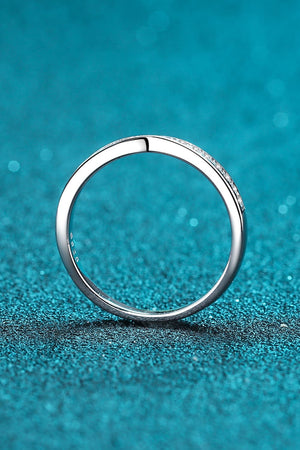 Silver twisted pavé band ring with small clear stones.