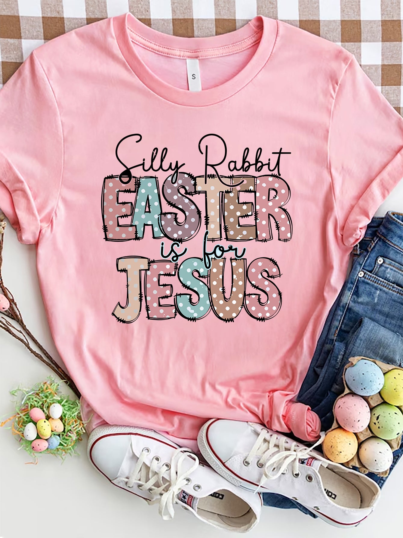 Pink Easter graphic tee with pastel polka dot text "Silly Rabbit EASTER is for JESUS