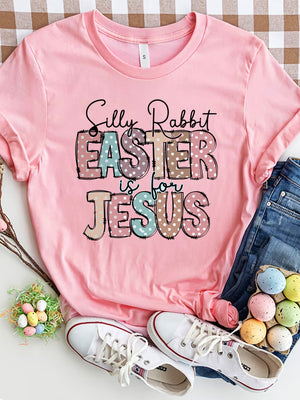 Pink Easter graphic tee with pastel polka dot text "Silly Rabbit EASTER is for JESUS