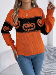 Orange acrylic knit sweater with black jack-o'-lantern intarsia pattern and crew neck.