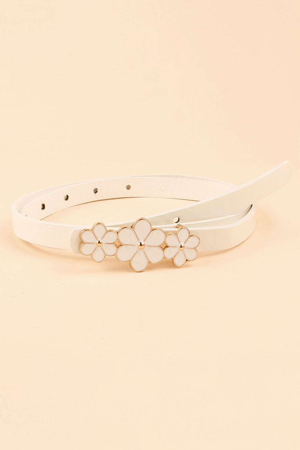 White skinny belt with gold and white floral buckle detail