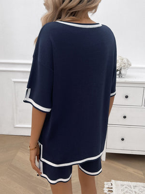 Dark Blue knit lounge set with white contrast trim on neckline, sleeves, and shorts.