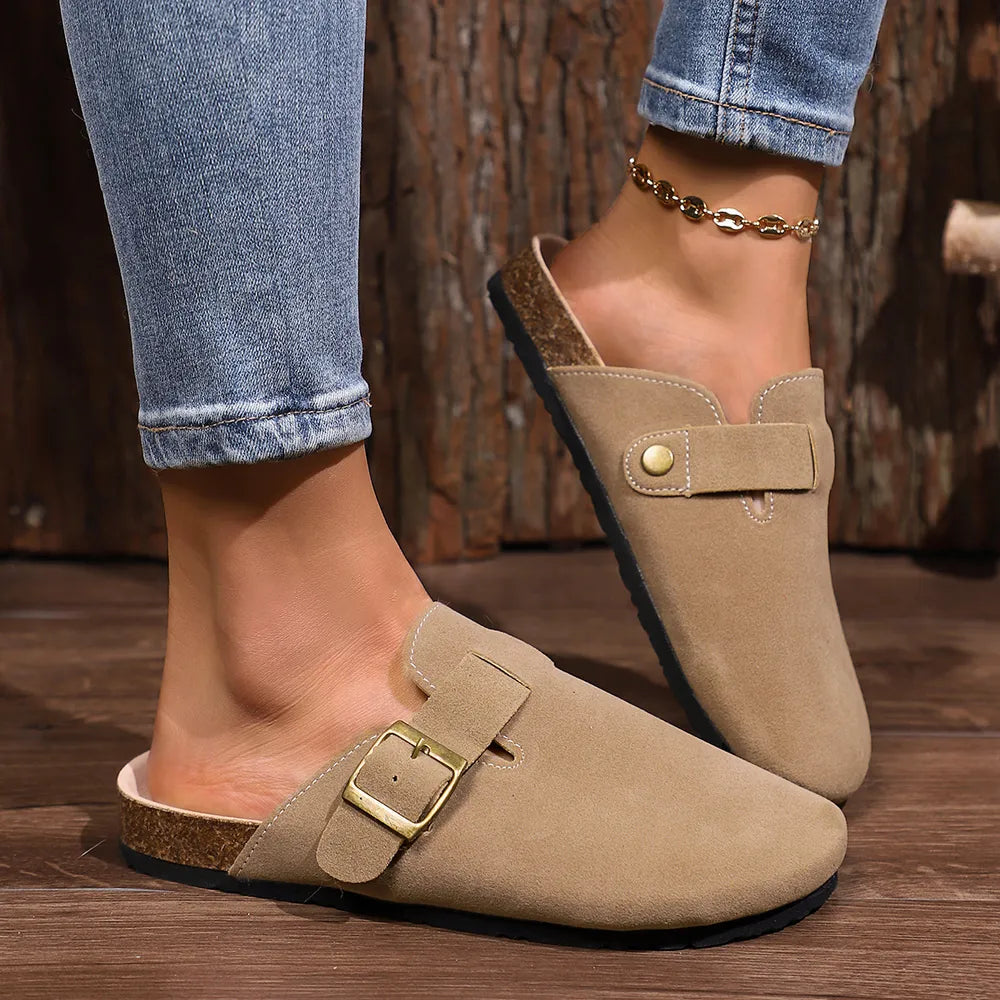 Suede buckle mules in mocha with cork sole detail and brass buckle.