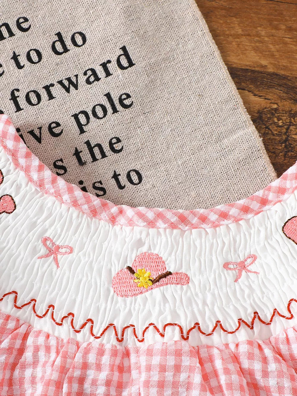 Children's Smocked Plaid Ruffle Sleeve Dress in Pink, side view