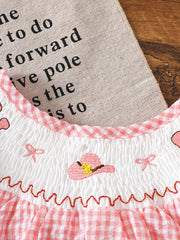 Children's Smocked Plaid Ruffle Sleeve Dress in Pink, side view