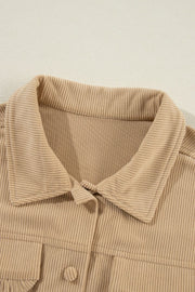 Tan corduroy utility shirt with ruffled pockets and button front detail.