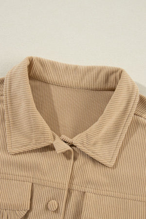 Tan corduroy utility shirt with ruffled pockets and button front detail.