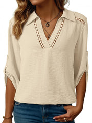 Apricot crinkled texture shirt with Johnny collar, V-neck, and roll-tab sleeves.