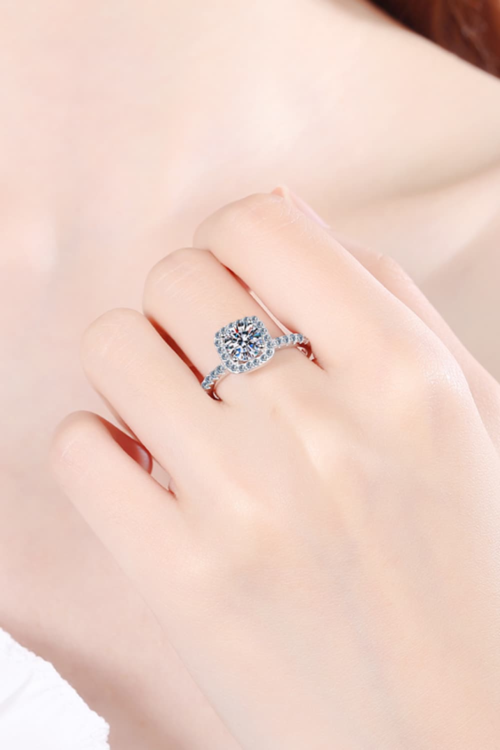 Radiant Square Cut Halo Ring in silver, 925 sterling silver with a halo of small stones.