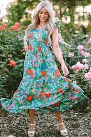 Green floral ruffle-sleeve tiered midi dress with square neckline and flowy skirt.
