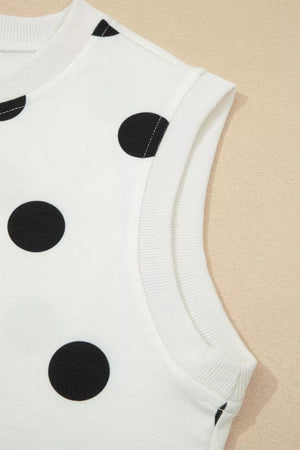 White polka dot sleeveless top with ribbed trim detail