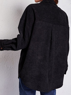 Black corduroy overshirt with button cuff and back pleat detail.